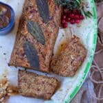 nut roast sliced on a plate.