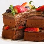 chocolate cake on to white cake stand