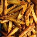 close up shot of air fryer chips with salt on them.