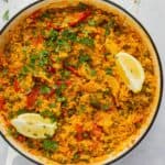 overhead shot of paella in large white pan
