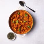 Pumpkin Curry with Quinoa served in a casserole dish.