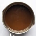 mushroom gravy served in a metal pot.