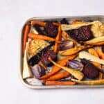 Roasted Root Vegetables on a roasting tray.