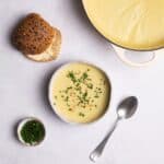 Leek and Potato Soup served in a bowl.