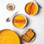 carrot and lentil soup served with toast.