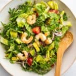 prawn salad with avocado served in a bowl.