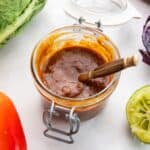 salad dressing with peanut butter in a glass jar.