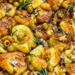 Smashed potatoes with olives.