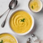 Curried parsnip soup served in a bowl.