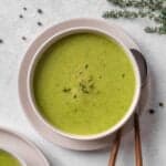 Courgette soup served in a plate.