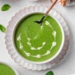 Spinach soup served in a plate.