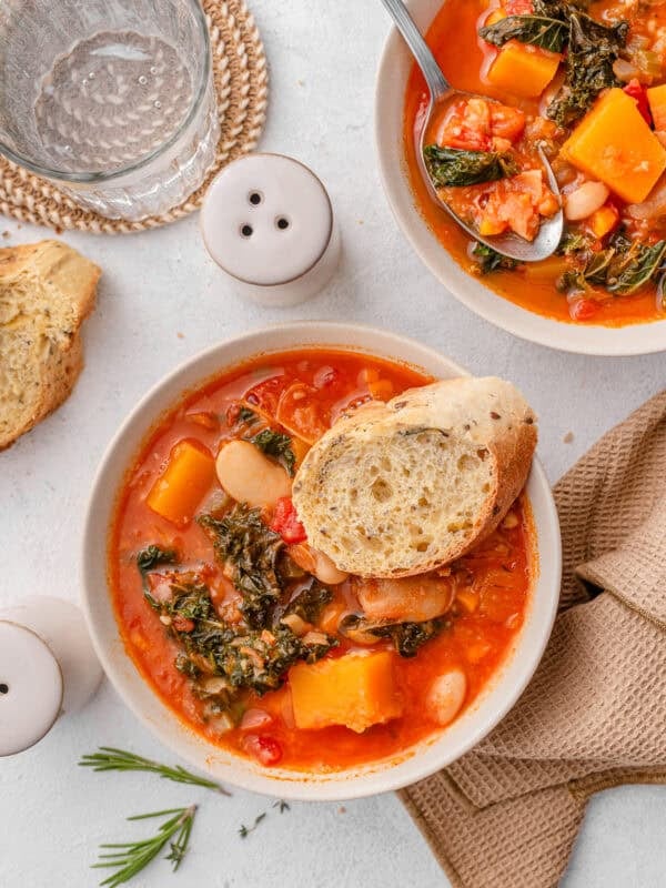 One-pot squash and butter bean stew with kale and crusty bread