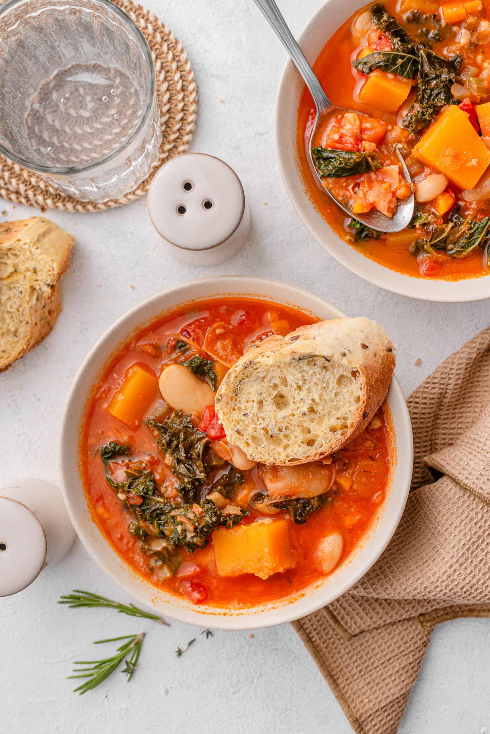 One-pot squash and butter bean stew with kale and crusty bread